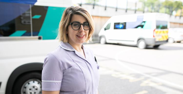 picture of staff by an ambulance