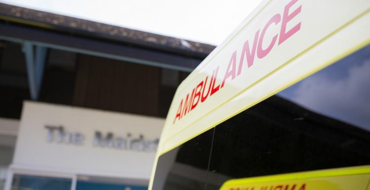 Ambulance parked up outside of a hospital