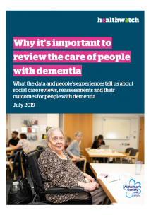 Dementia report front cover shows an older woman sitting in a wheelchair at a care centre.